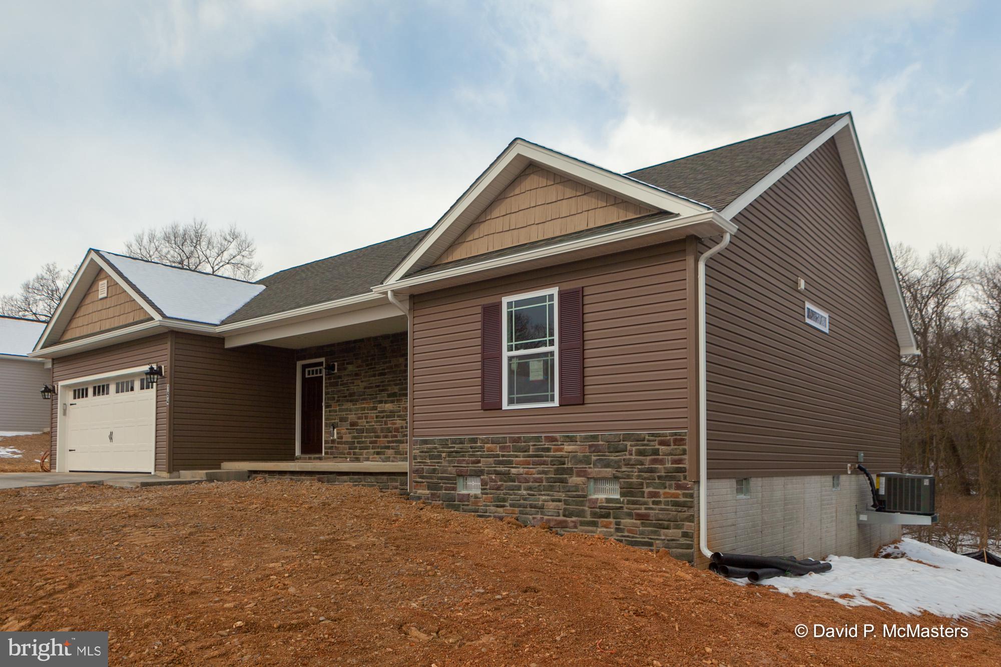 194 Dimension Road Inwood, WV 25428 - Photo 3 of 26 a view of a house with a yard