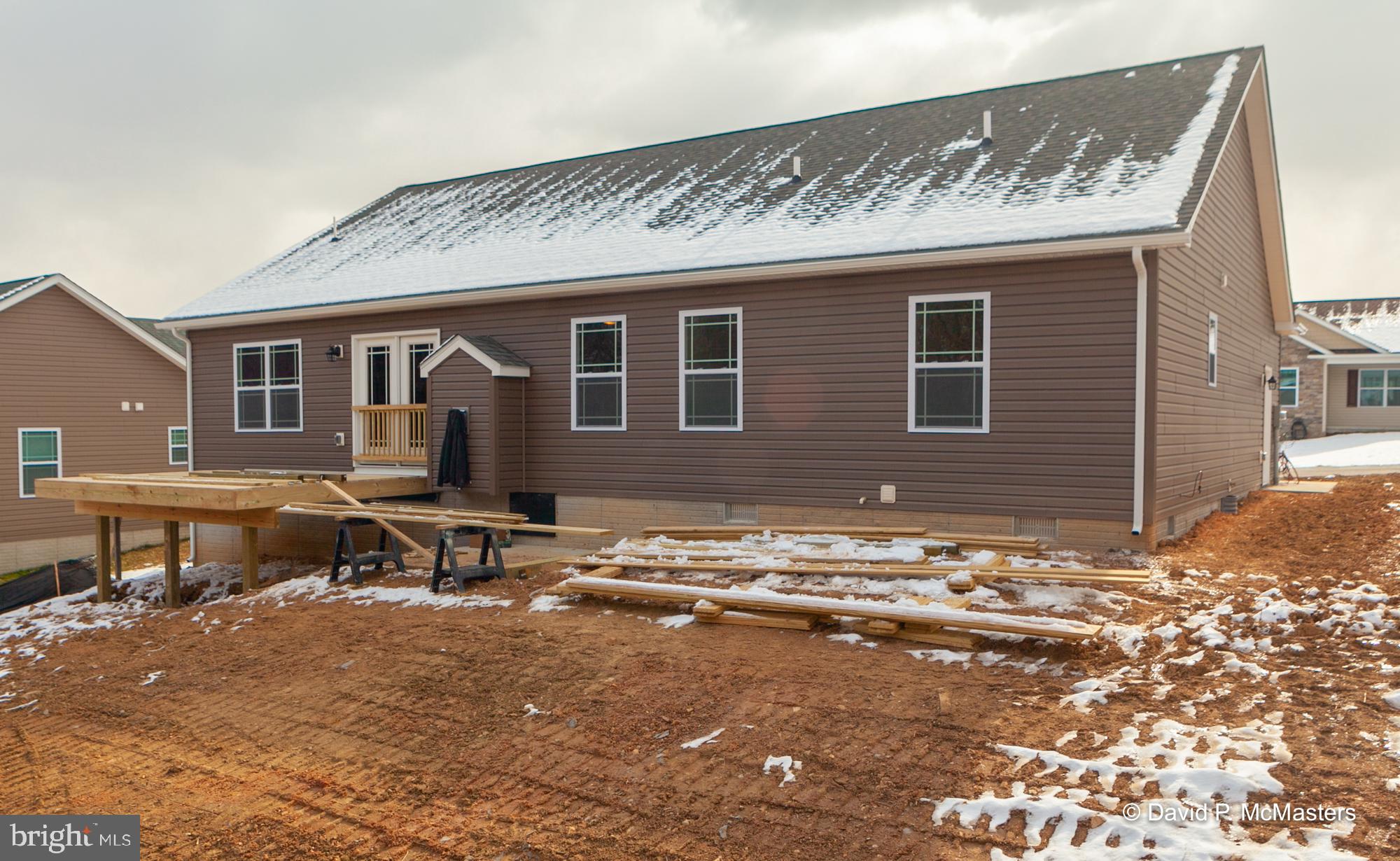 194 Dimension Road Inwood, WV 25428 - Photo 25 of 26 a backyard of a house with yard and outdoor seating
