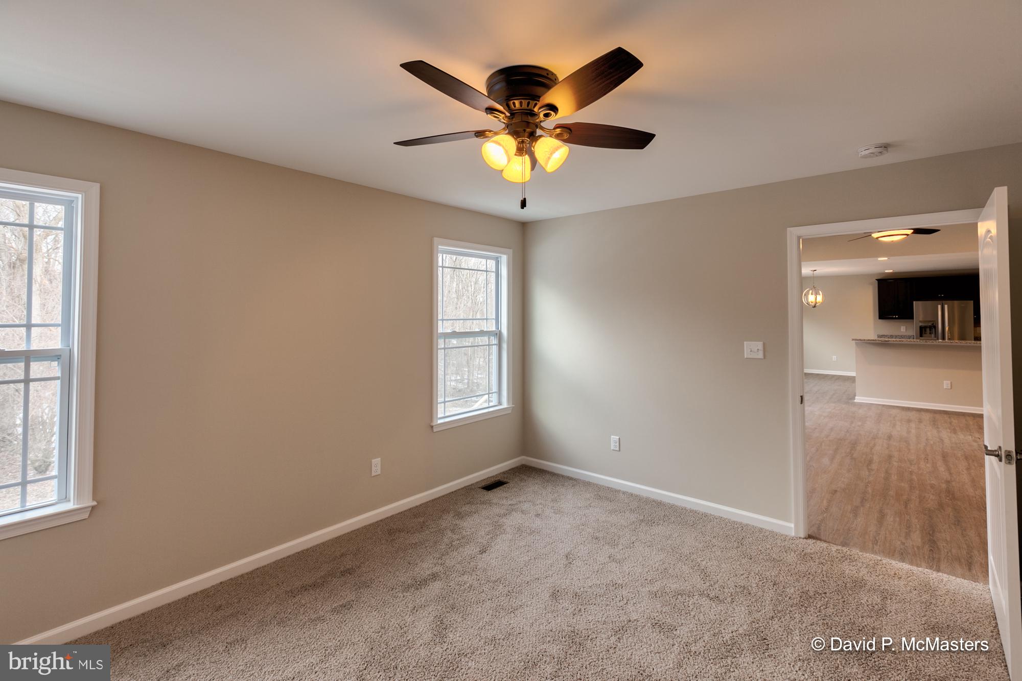 194 Dimension Road Inwood, WV 25428 - Photo 7 of 26 a view of an empty room with a window