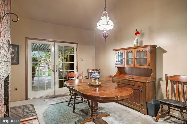 a kitchen with stainless steel appliances granite countertop a refrigerator and a stove