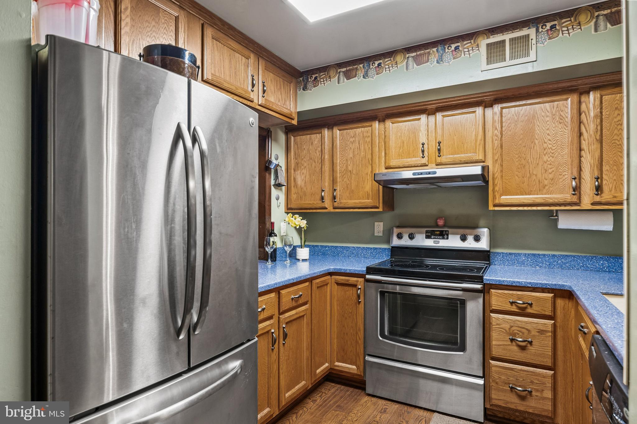 25 Panama Road Chatsworth, NJ 08019 - Photo 12 of 50 a kitchen with stainless steel appliances granite countertop a refrigerator and a stove