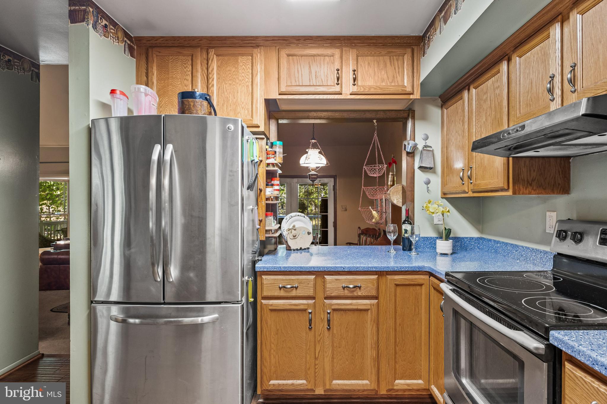 25 Panama Road Chatsworth, NJ 08019 - Photo 13 of 50 a kitchen with stainless steel appliances granite countertop a refrigerator a stove and a sink