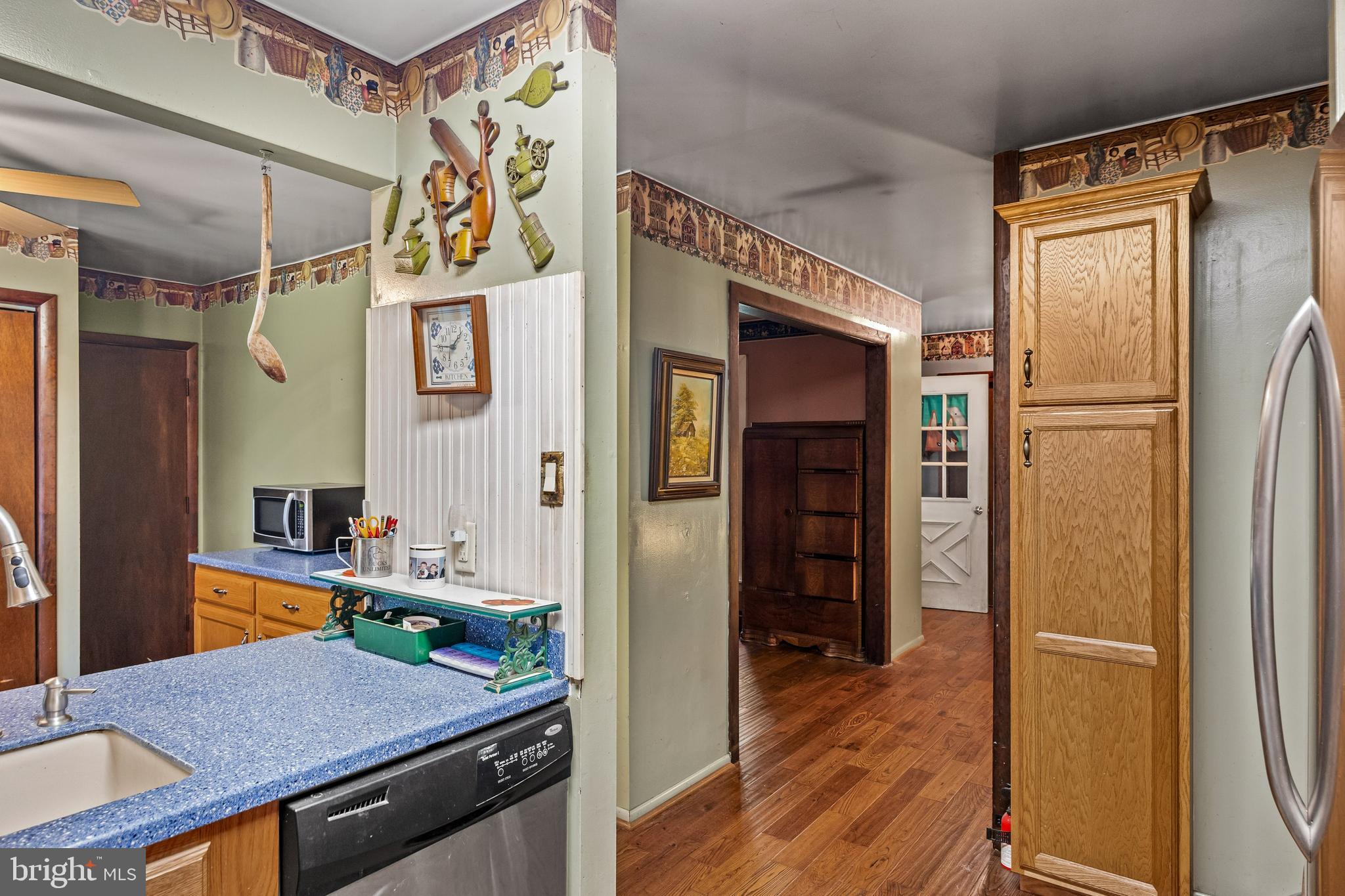 25 Panama Road Chatsworth, NJ 08019 - Photo 15 of 50 a kitchen with stainless steel appliances granite countertop a refrigerator and a stove