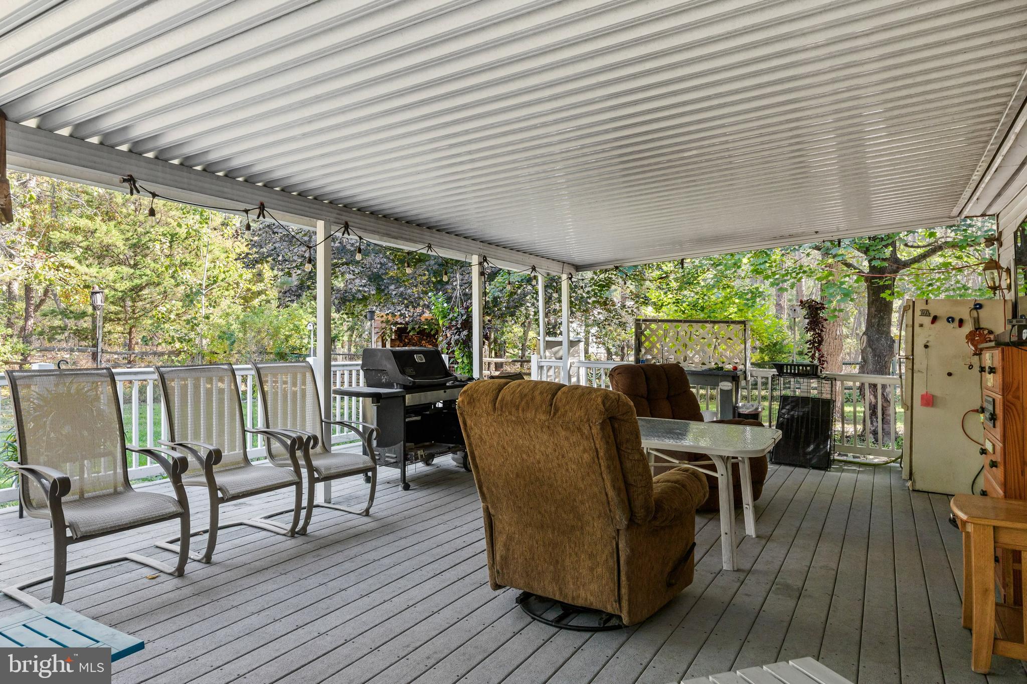 25 Panama Road Chatsworth, NJ 08019 - Photo 25 of 50 a view of a dining room with furniture window and wooden floor
