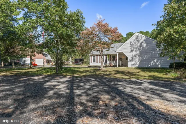 a view of a house with a big yard