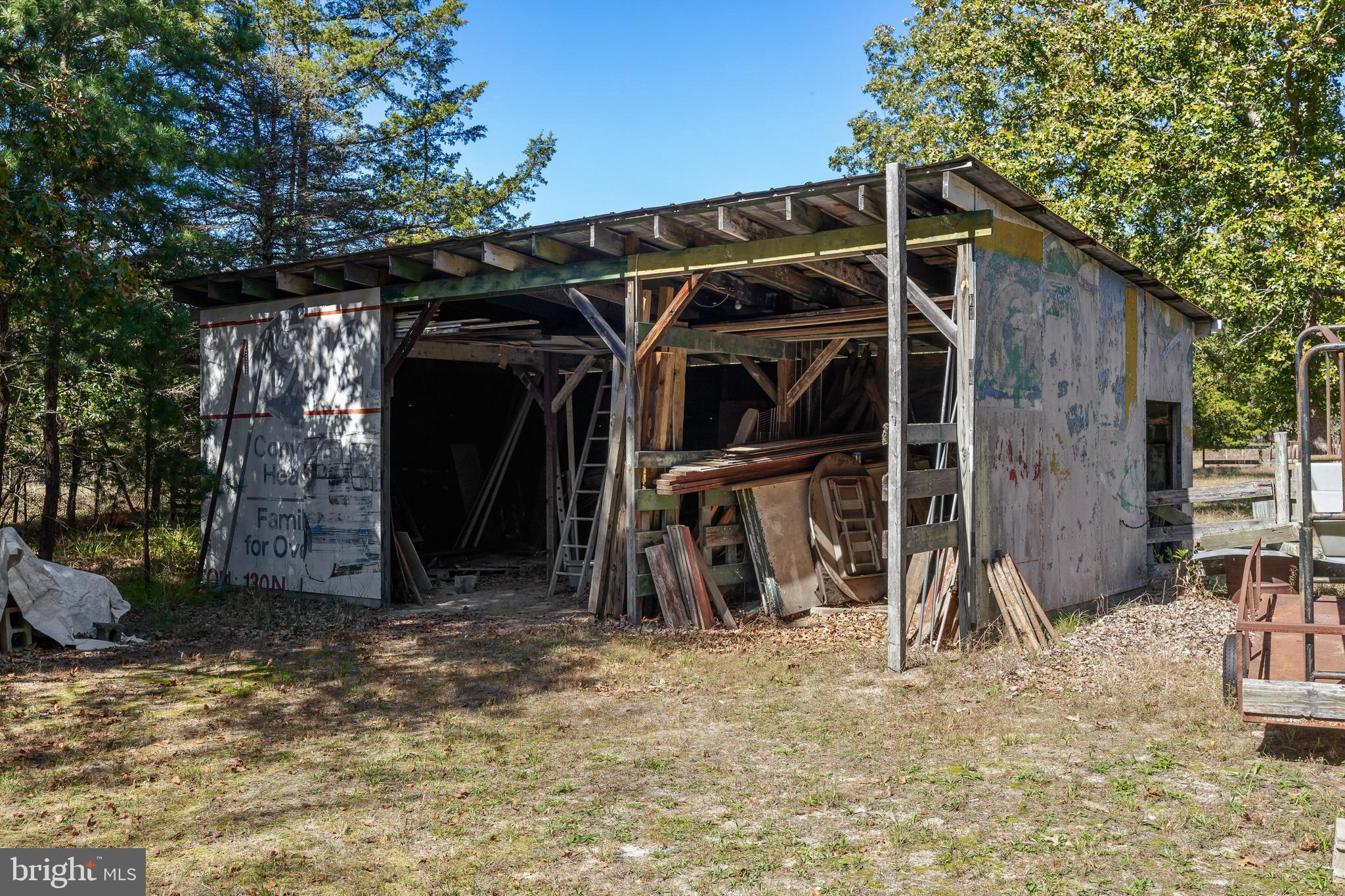 25 Panama Road Chatsworth, NJ 08019 - Photo 36 of 50 a view of a storage room with a small yard