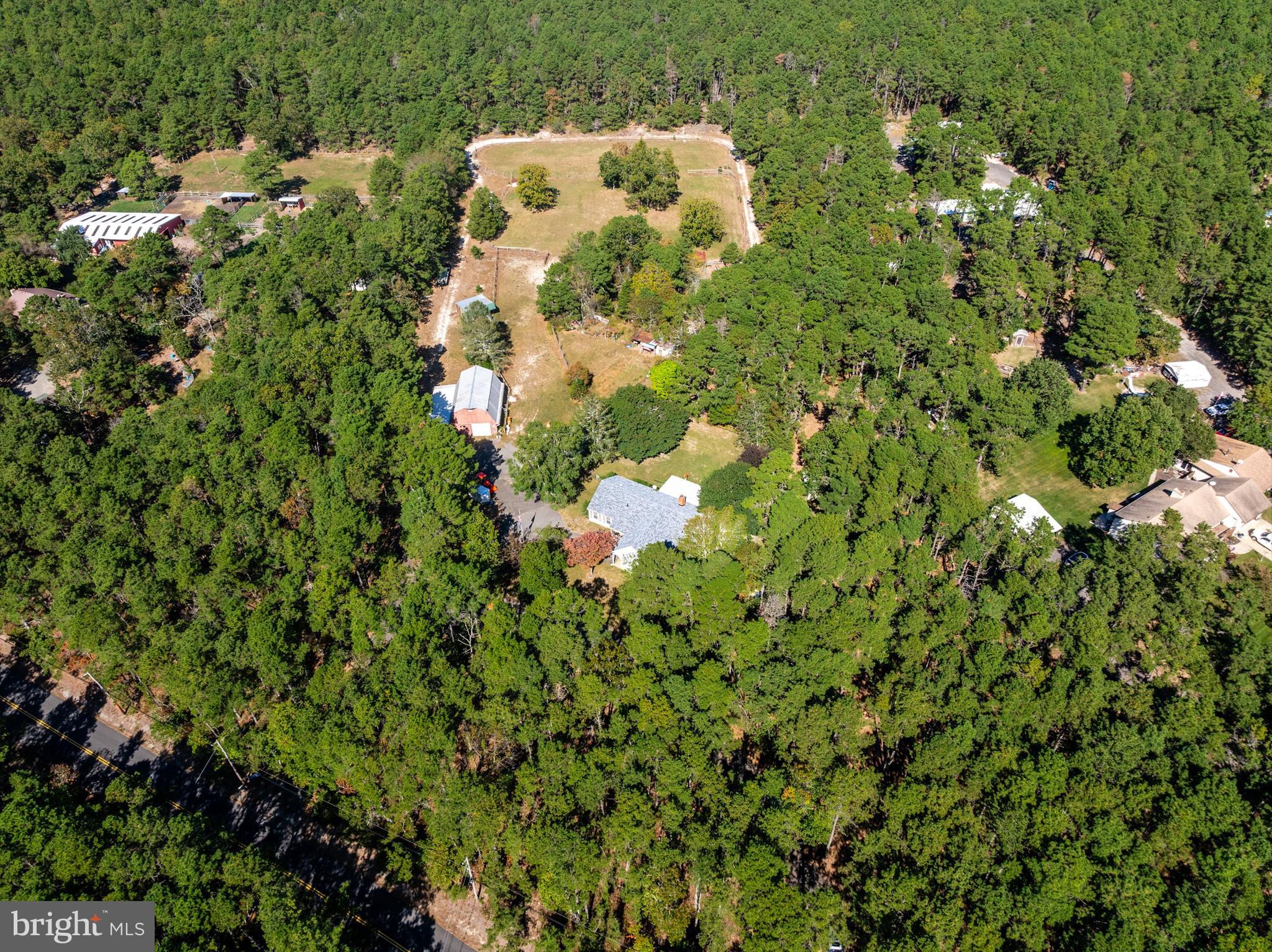 25 Panama Road Chatsworth, NJ 08019 - Photo 47 of 50 a picture of a house with a tree