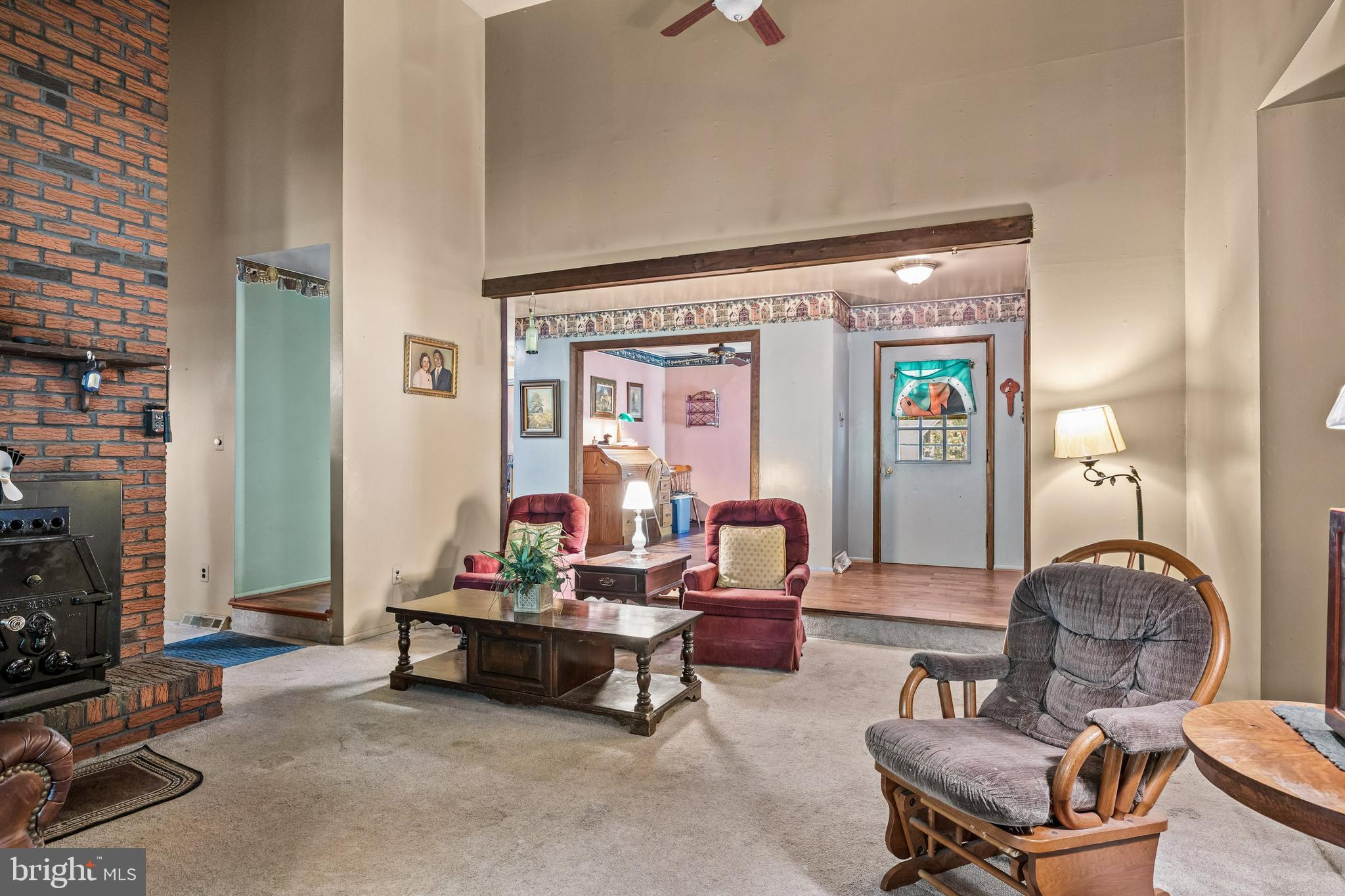 25 Panama Road Chatsworth, NJ 08019 - Photo 10 of 50 a living room with furniture a fireplace and a flat screen tv