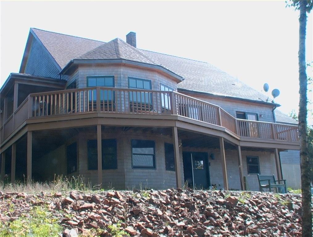 1037 North Lubec Road Lubec, ME 04652 - Photo 1 of 35 Beautiful home with wrap around deck...