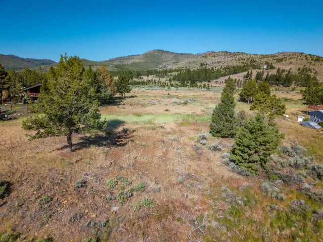 a view of mountain view with mountains in the background