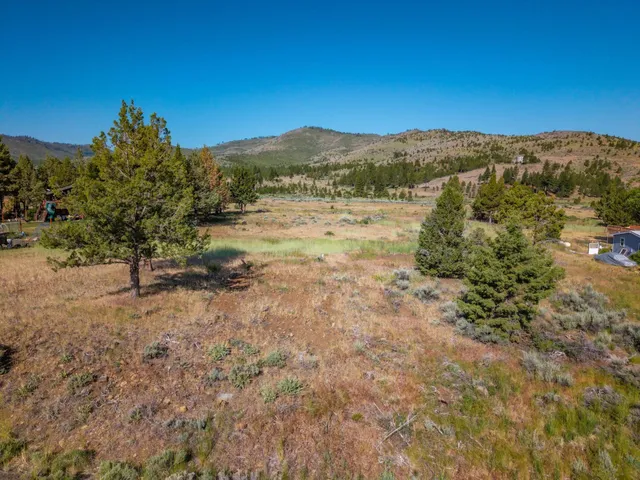 a view of mountain view with mountains in the background