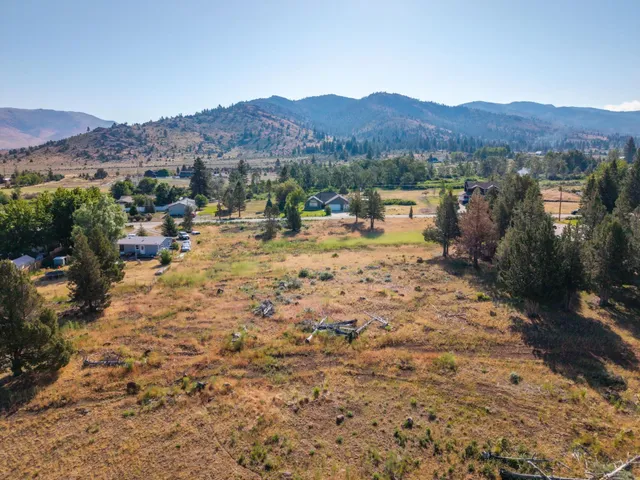 a view of a lake with mountain