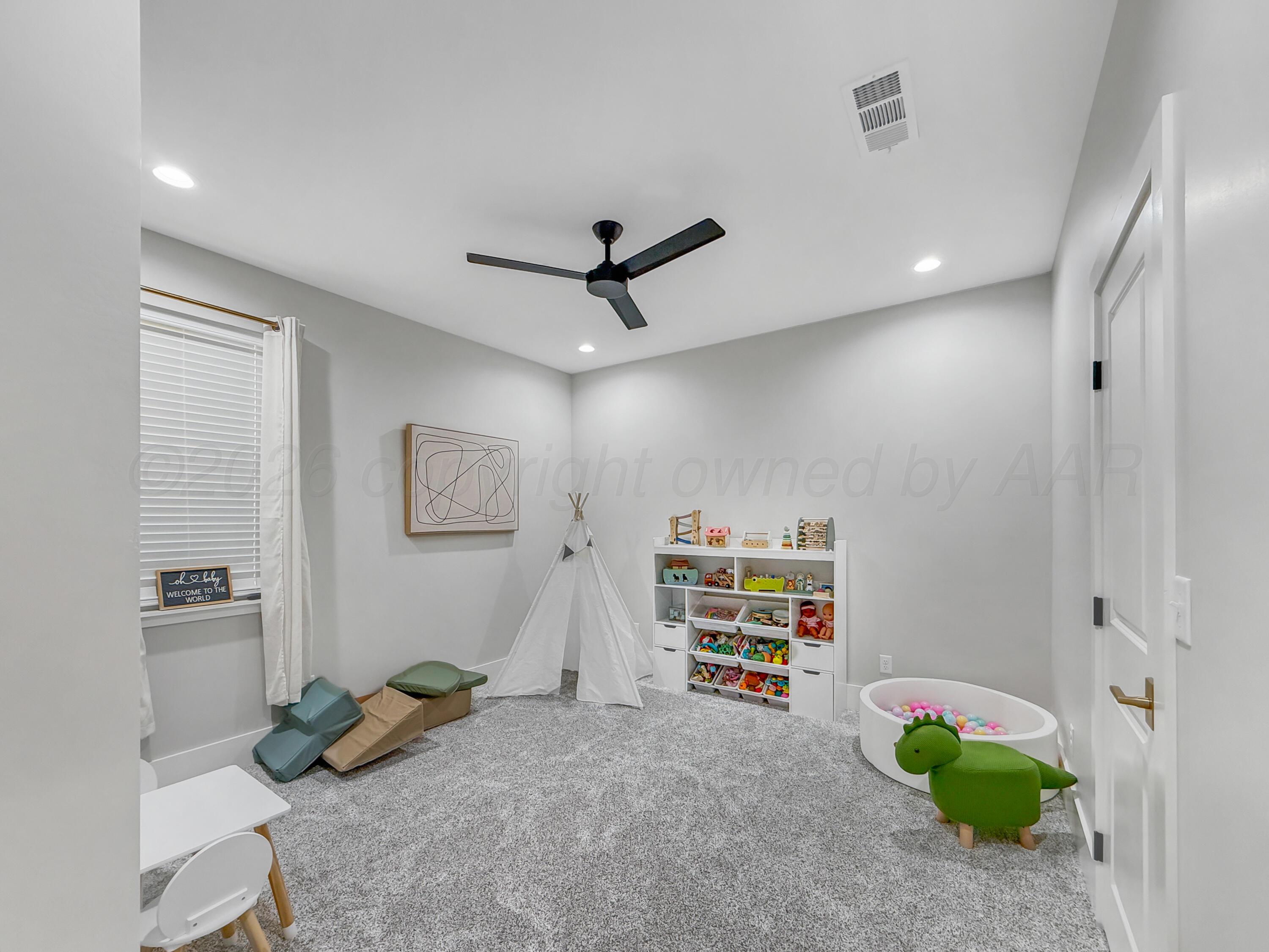 3701 Longhorn Springs Road Amarillo, TX 79119 - Photo 35 of 48 a living room with furniture and a window