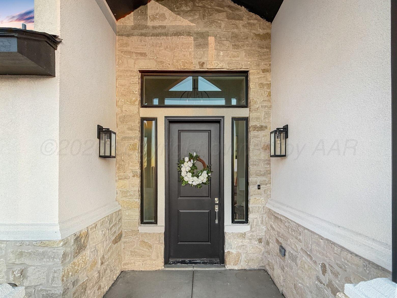 3701 Longhorn Springs Road Amarillo, TX 79119 - Photo 5 of 48 a front view of a house with natural light