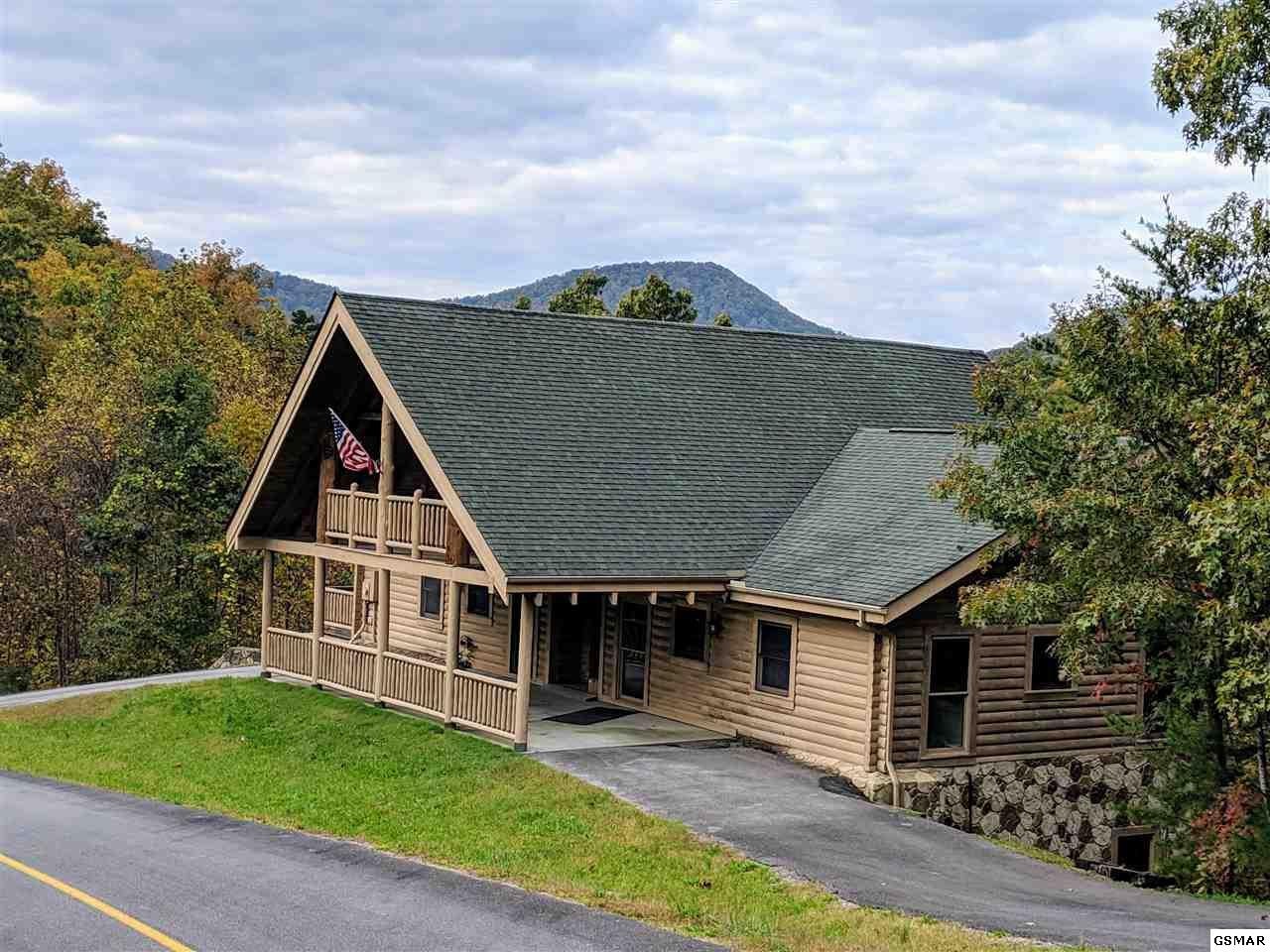 4409 Deerskin Road Sevierville, TN 37862 - Photo 27 of 31 a house view with a garden space