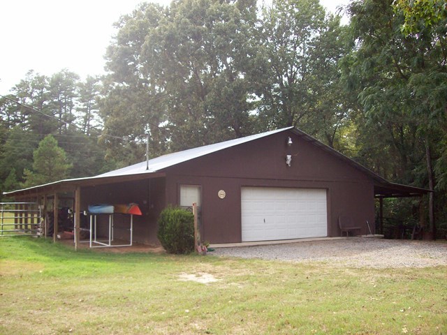 396 Buck Road Gray, GA 31032 - Photo 19 of 36 a backyard of a house with yard and garage