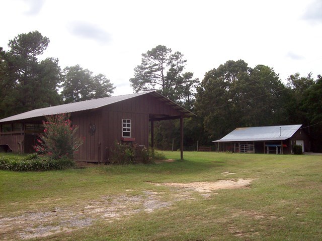 396 Buck Road Gray, GA 31032 - Photo 24 of 36 a house with swimming pool in front of it
