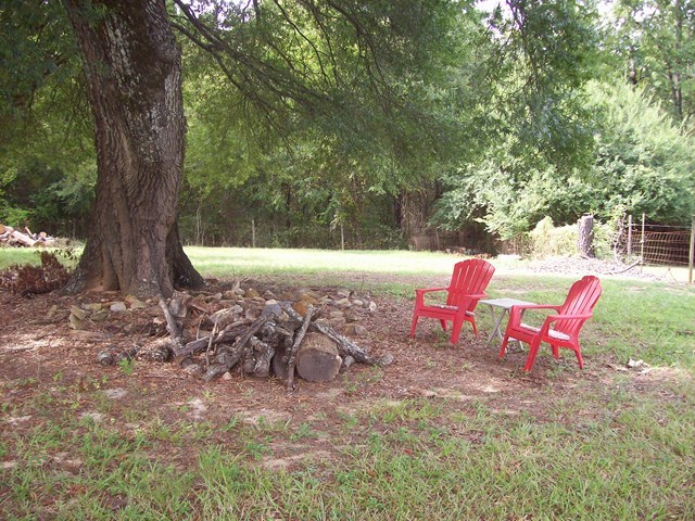 396 Buck Road Gray, GA 31032 - Photo 26 of 36 a view of a yard with an outdoor space