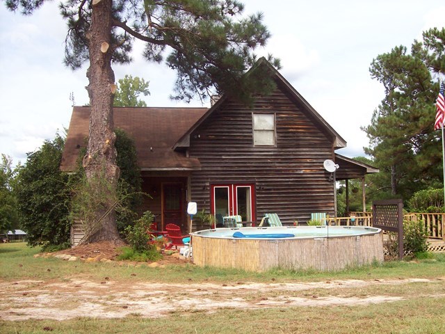 396 Buck Road Gray, GA 31032 - Photo 29 of 36 a front view of a house with a yard