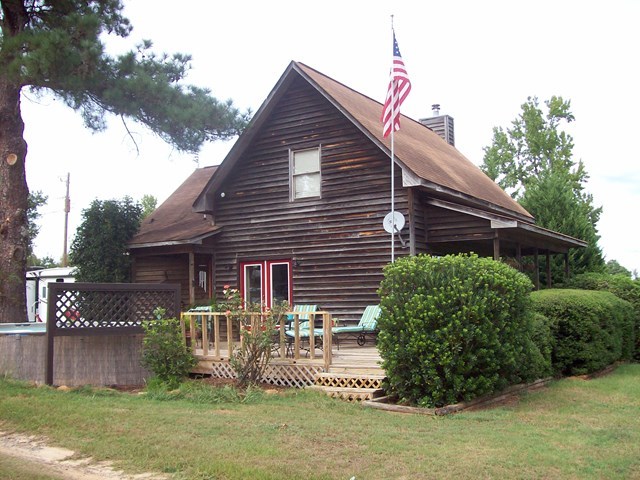 396 Buck Road Gray, GA 31032 - Photo 30 of 36 a front view of a house with garden