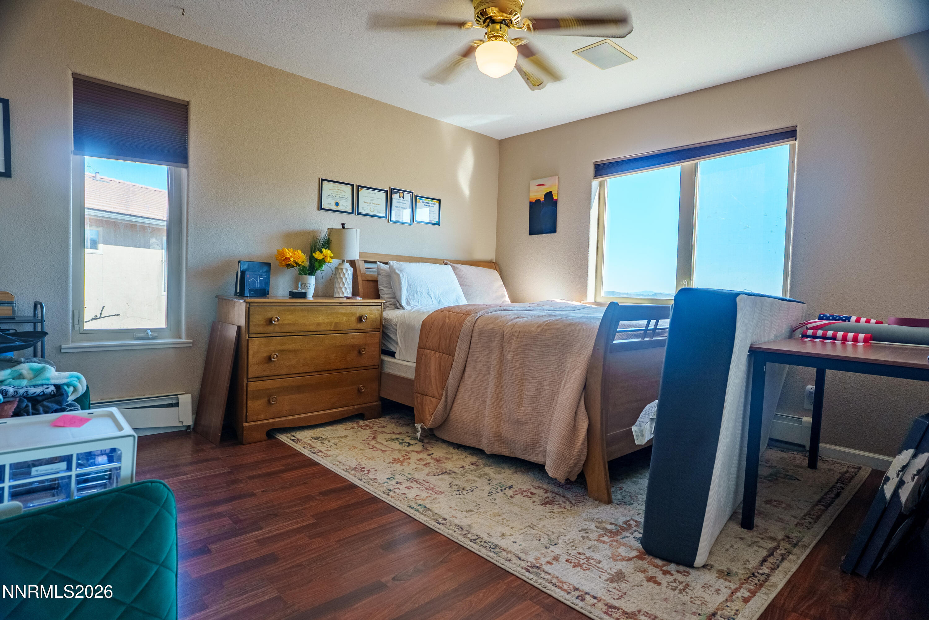 12000 North Red Rock Road Reno, NV 89508 - Photo 13 of 18 a bedroom with a bed and wooden floor