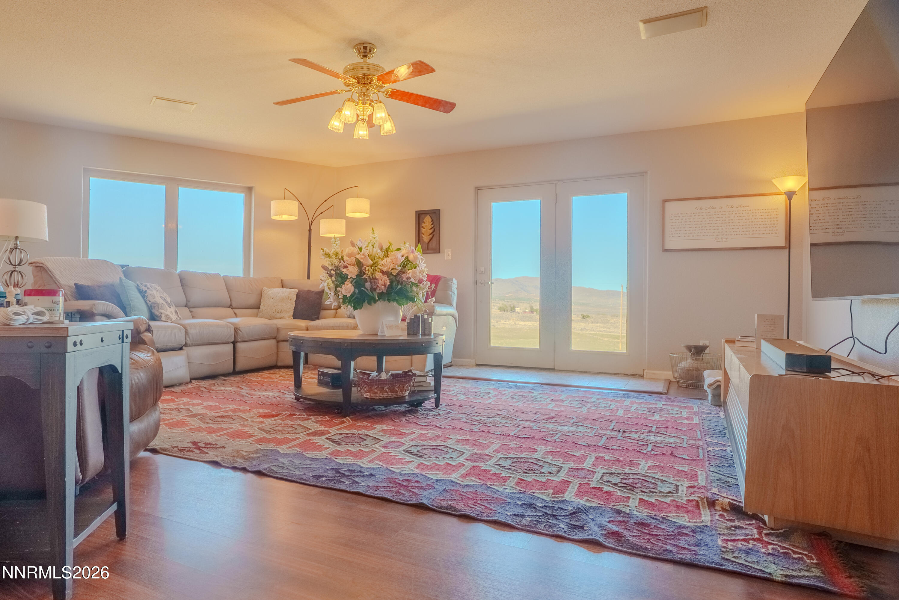 12000 North Red Rock Road Reno, NV 89508 - Photo 14 of 18 a living room with fireplace furniture and a large window