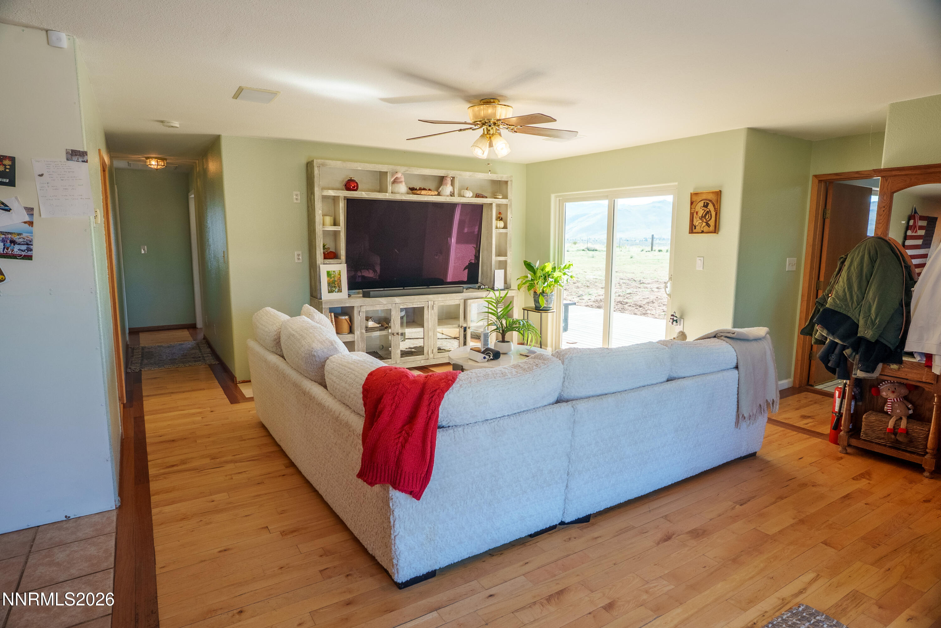 12000 North Red Rock Road Reno, NV 89508 - Photo 20 of 34 a living room with furniture and a flat screen tv
