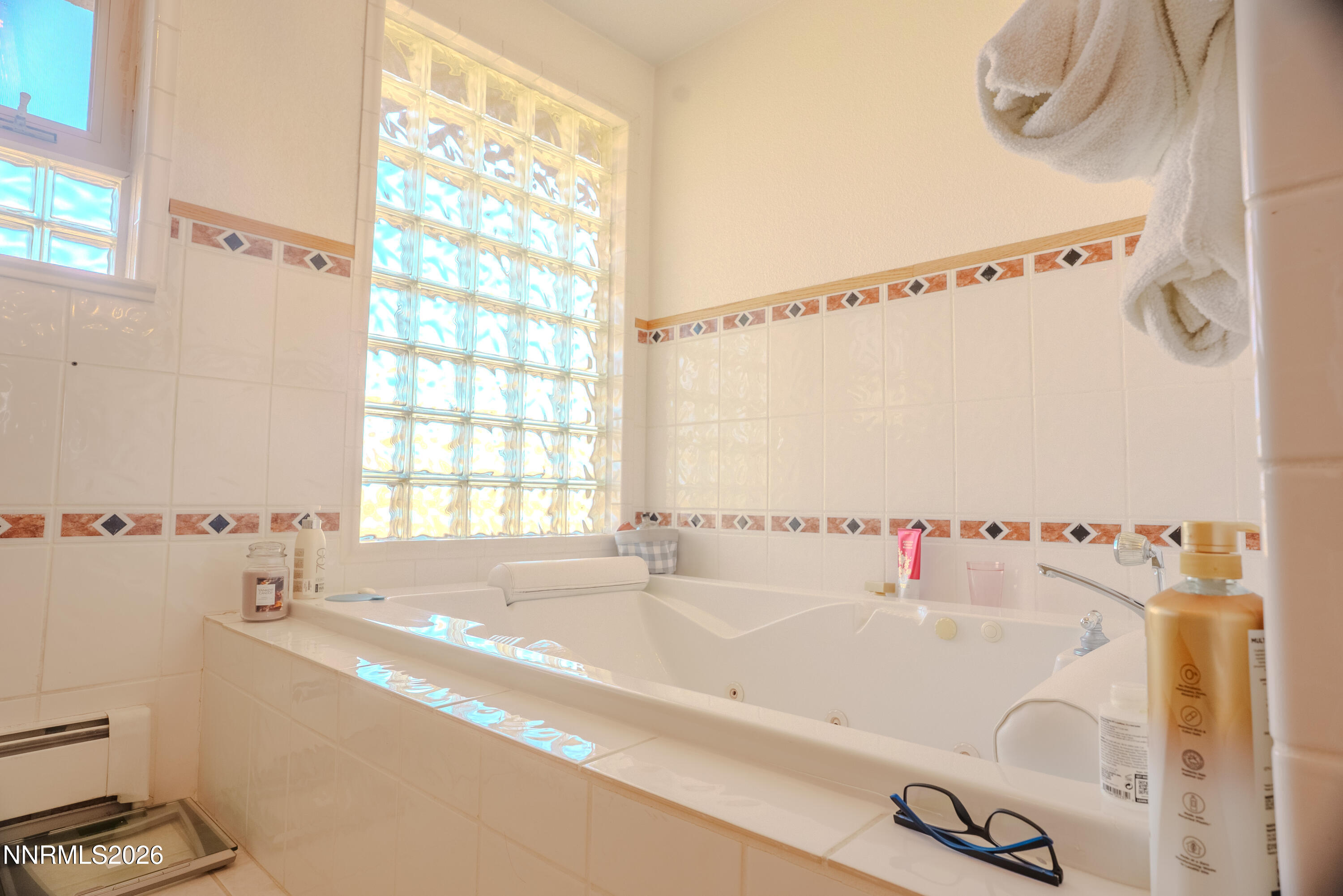 12000 North Red Rock Road Reno, NV 89508 - Photo 31 of 34 a bathroom with a bathtub and a shower