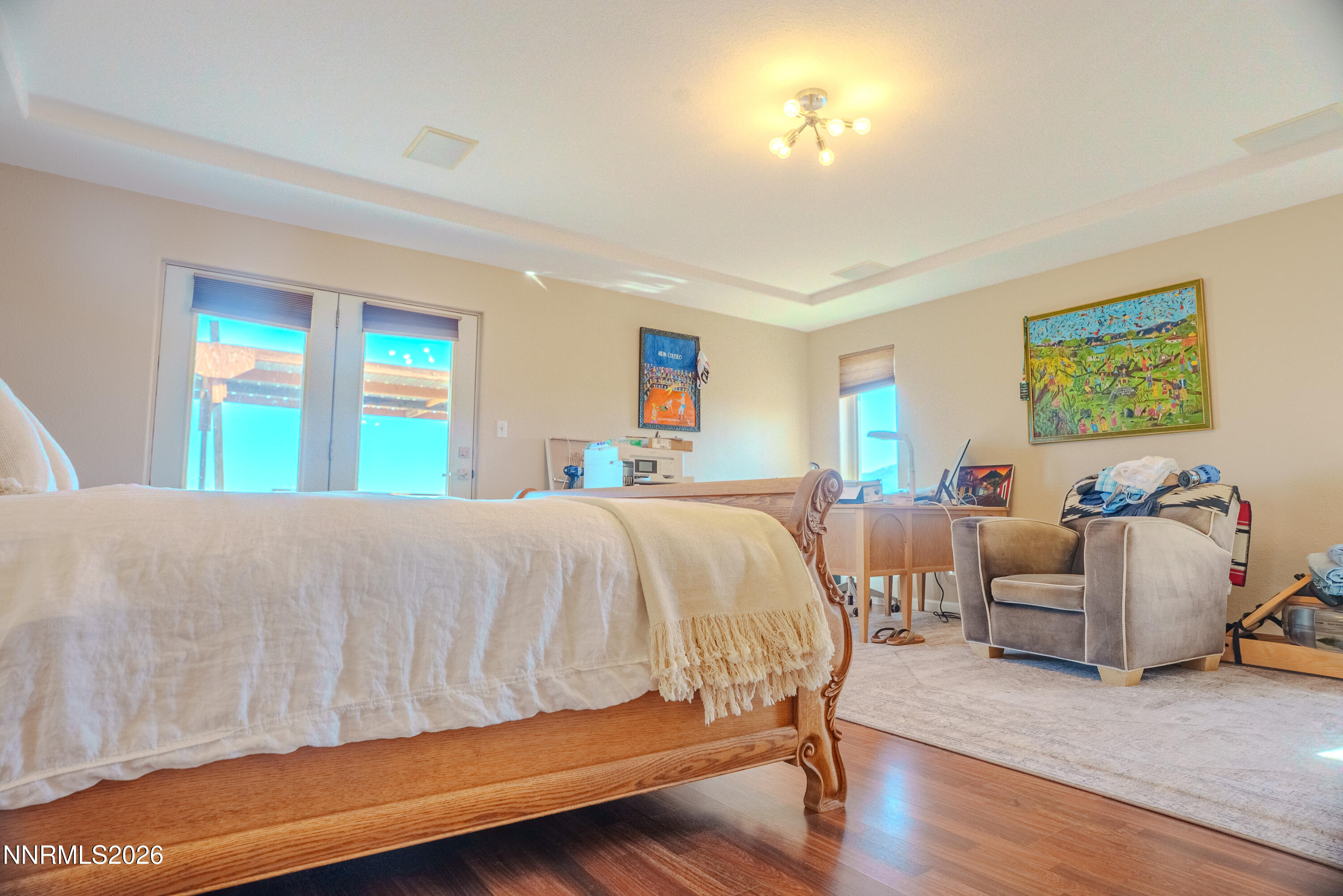 12000 North Red Rock Road Reno, NV 89508 - Photo 34 of 34 a spacious bedroom with a bed and a couch
