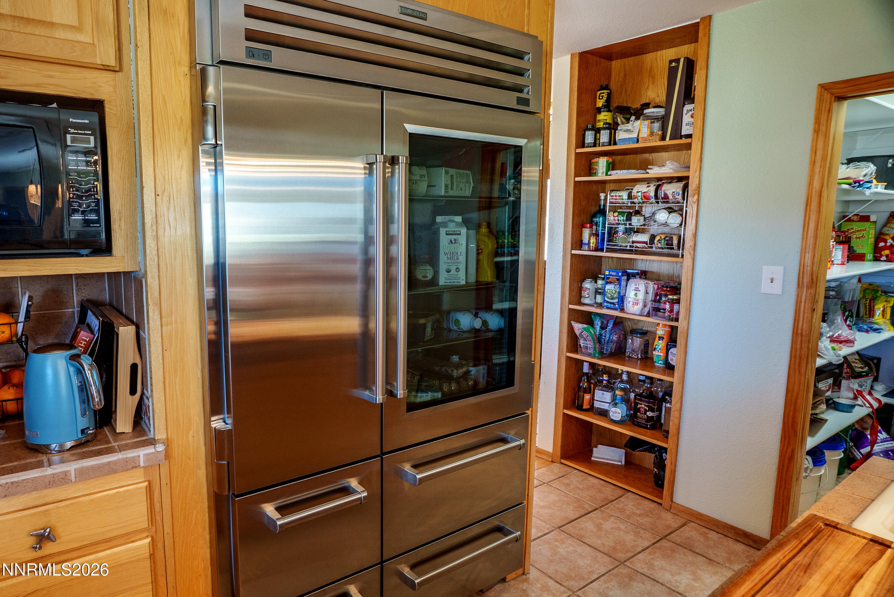 12000 North Red Rock Road Reno, NV 89508 - Photo 10 of 18 a view of walk in closet with clothes and shoes