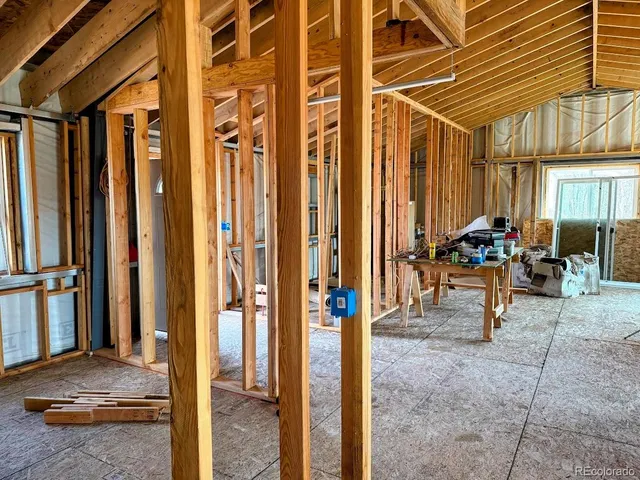 a view of front door with outdoor seating
