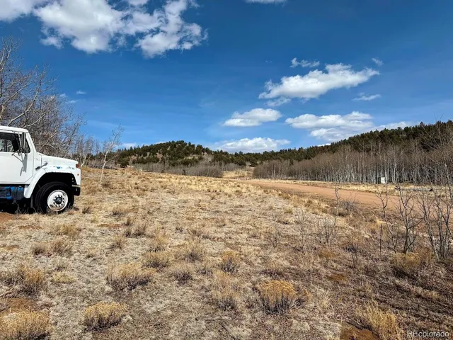 a view of a yard covered with snow