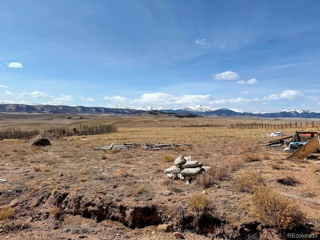 a view of a backyard of the house