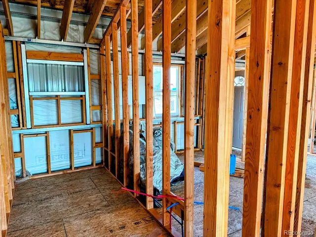 a view of front door with outdoor seating