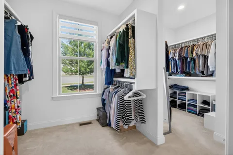 a room with furniture and a window