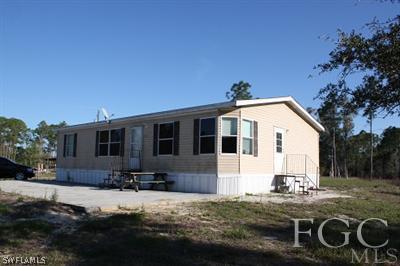413 F Road LaBelle, FL 33935 - Photo 1 of 1 a view of a house with backyard