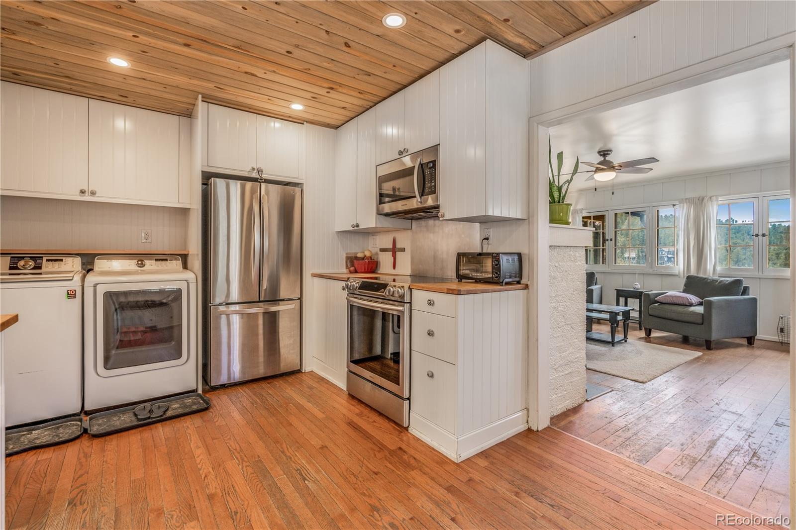 28344 Kinnikinnick Road Evergreen, CO 80439 - Photo 5 of 33 Gallery Image 5