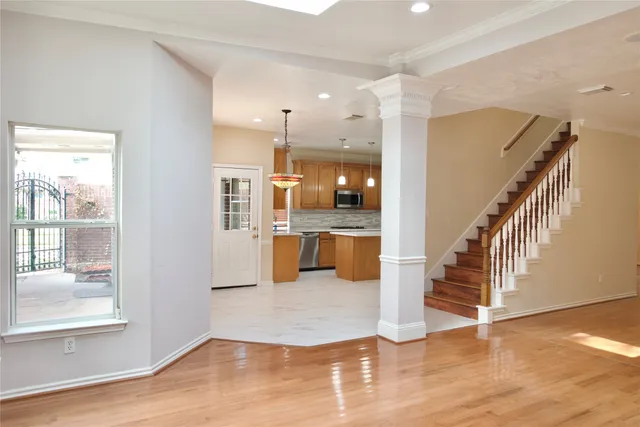 a view of kitchen with wooden floor