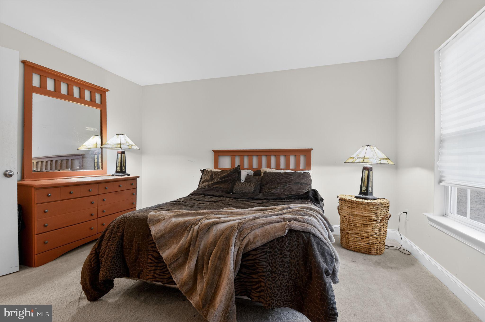 9009 Eldon Drive Clinton, MD 20735 - Photo 21 of 40 a bedroom with a bed and a window