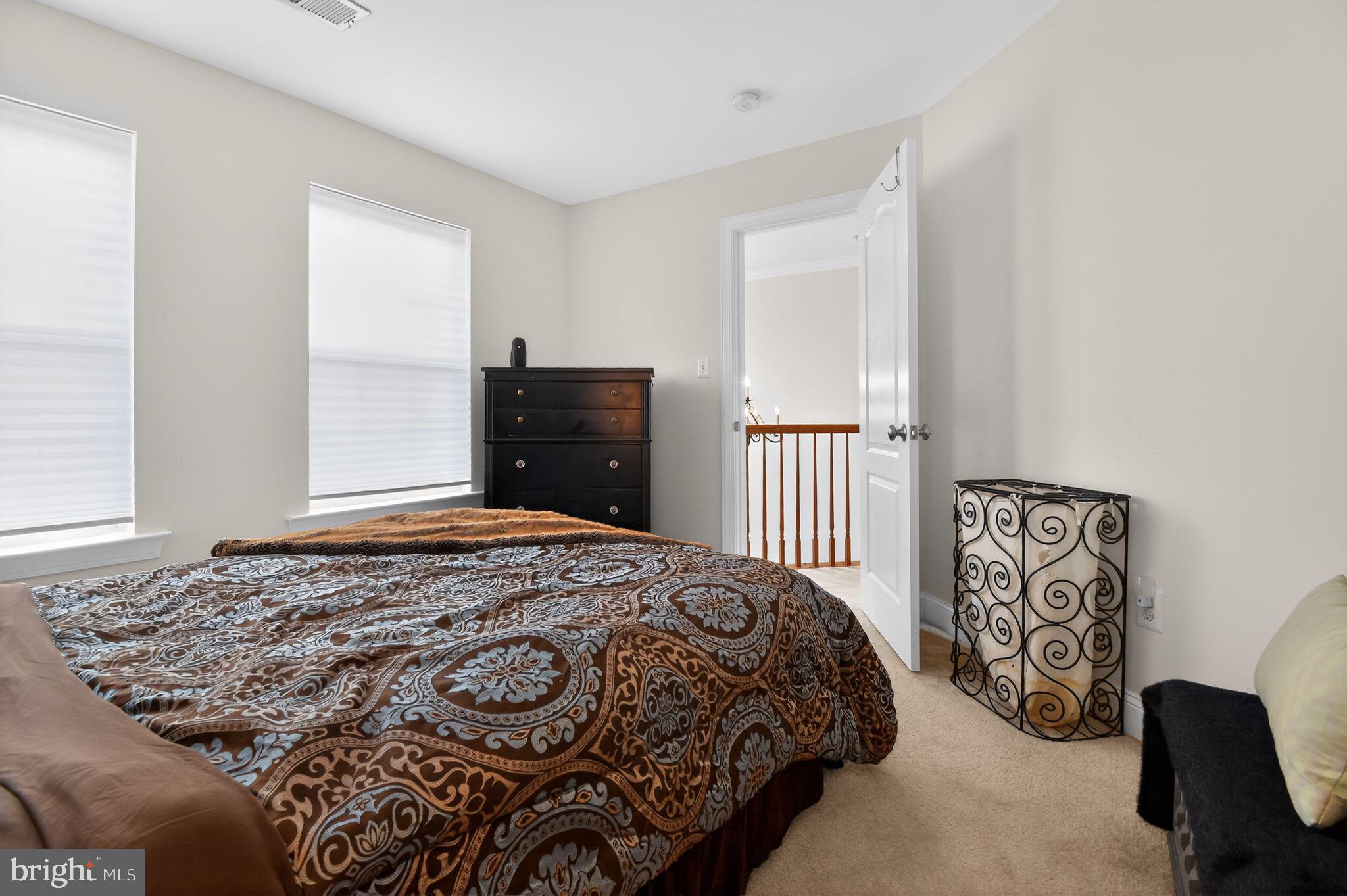 9009 Eldon Drive Clinton, MD 20735 - Photo 22 of 40 a bedroom with a bed and a window