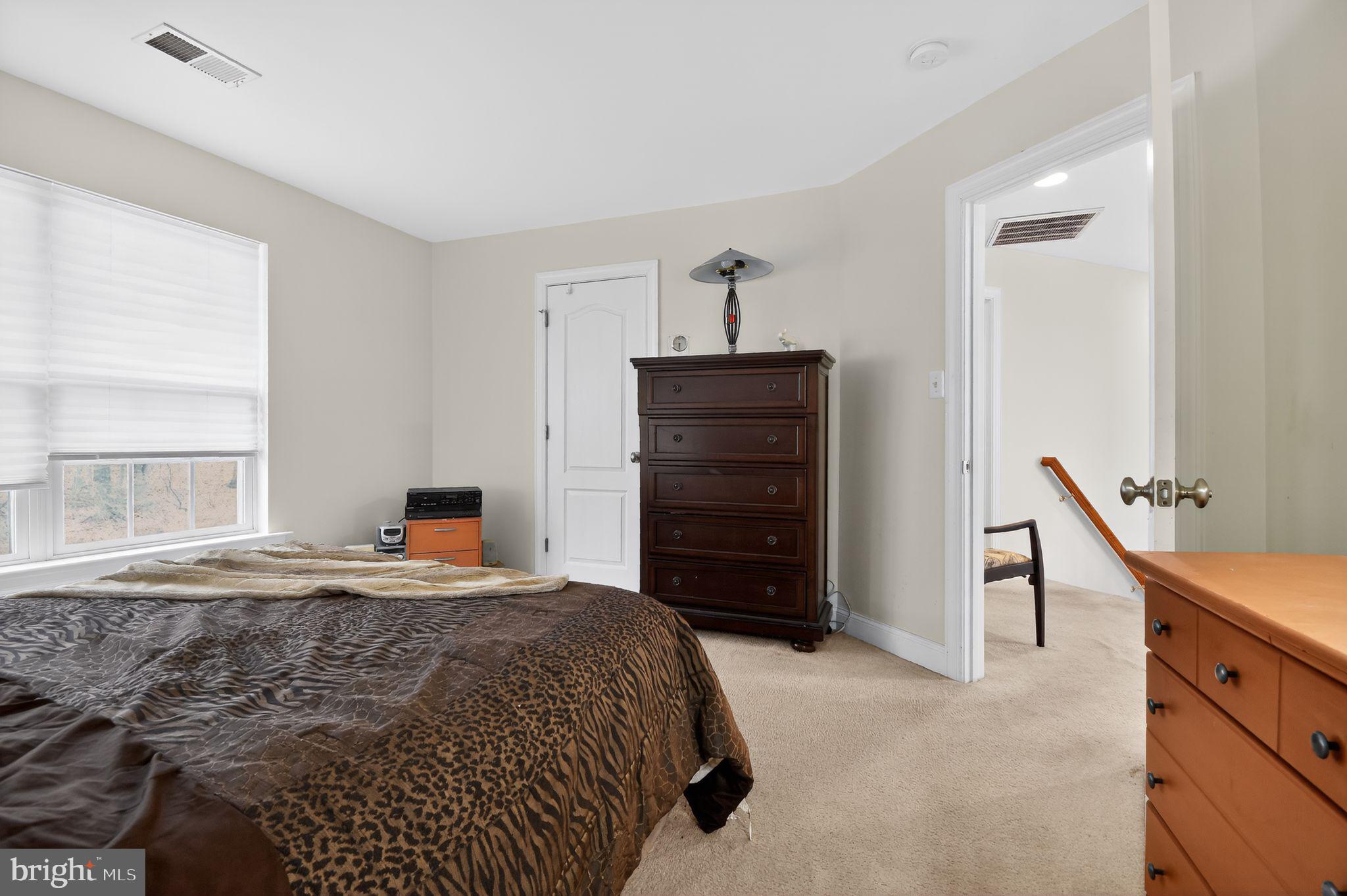 9009 Eldon Drive Clinton, MD 20735 - Photo 23 of 40 a bedroom with a bed and a window