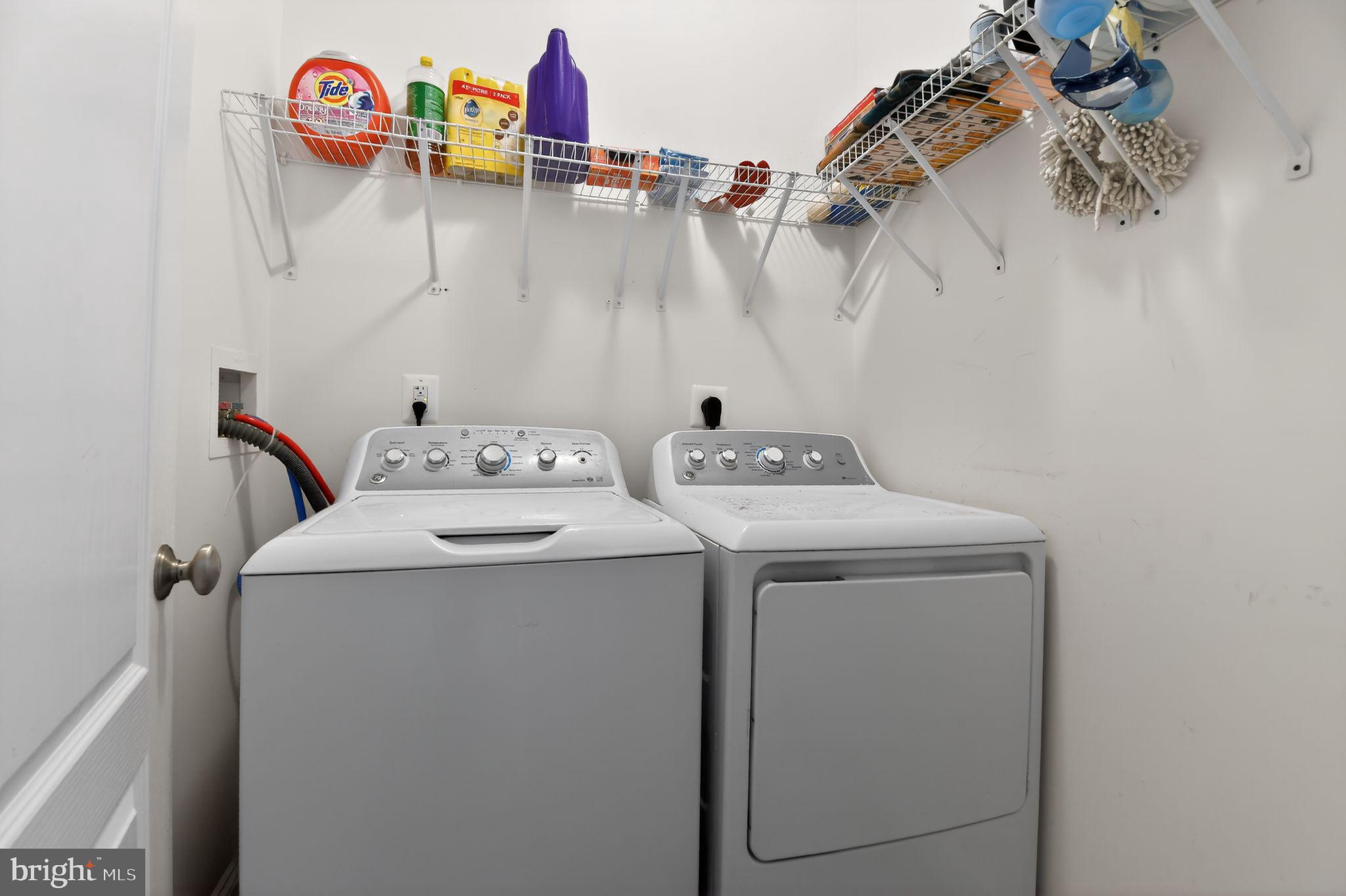 9009 Eldon Drive Clinton, MD 20735 - Photo 33 of 40 a utility room with dryer and washer