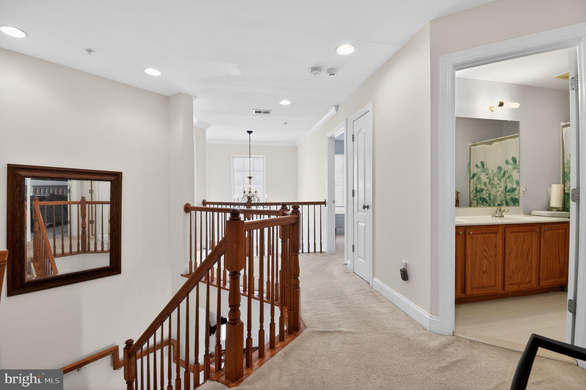 9009 Eldon Drive Clinton, MD 20735 - Photo 34 of 40 a view of a hallway with entryway to a bedroom