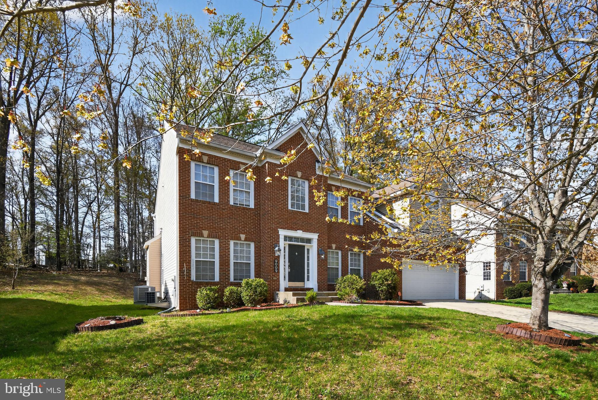 9009 Eldon Drive Clinton, MD 20735 - Photo 5 of 40 a view of a building with a yard