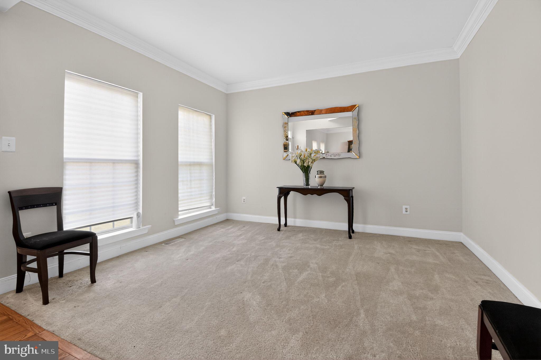 9009 Eldon Drive Clinton, MD 20735 - Photo 9 of 40 a view of a livingroom with furniture and windows