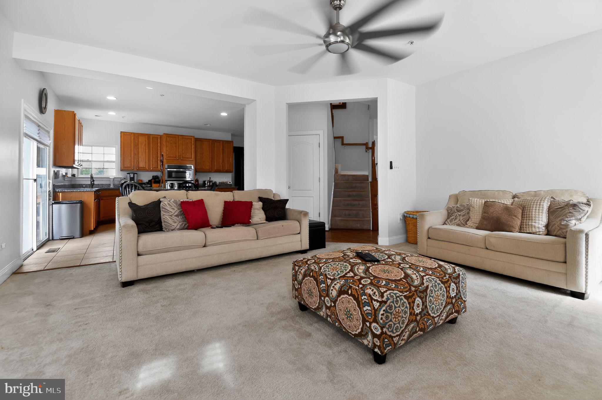 9009 Eldon Drive Clinton, MD 20735 - Photo 10 of 40 a living room with furniture and a couch