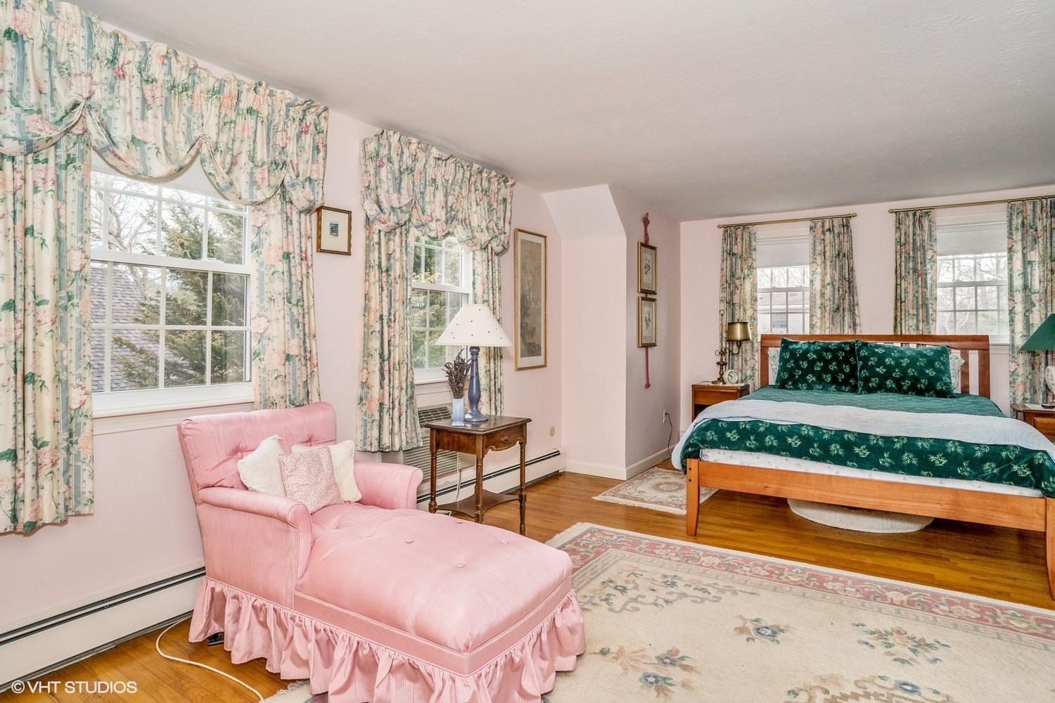 50 Deerfield Road Osterville, MA 02655 - Photo 11 of 14 a living room with furniture and a table