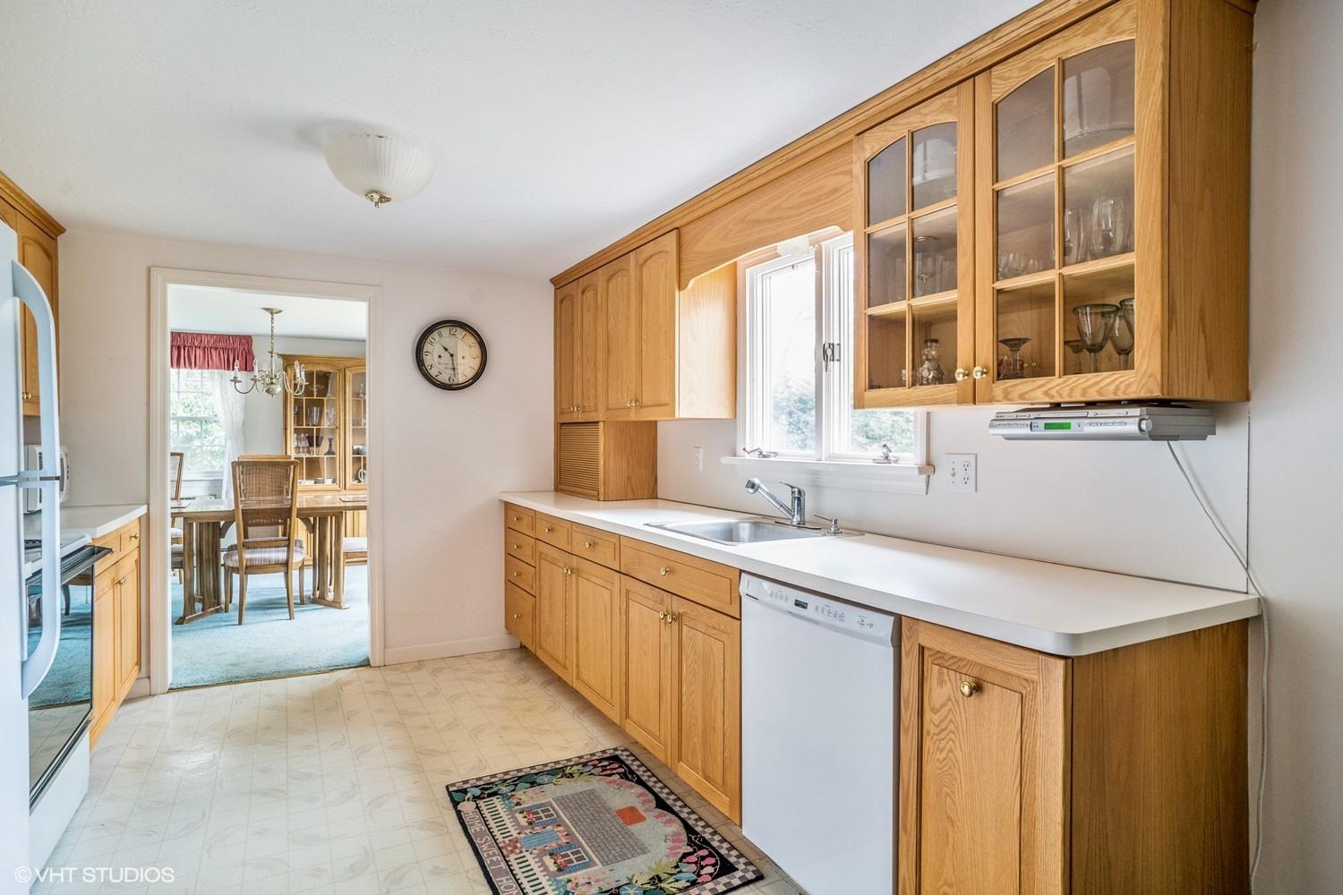 50 Deerfield Road Osterville, MA 02655 - Photo 4 of 14 a kitchen with a sink and a window