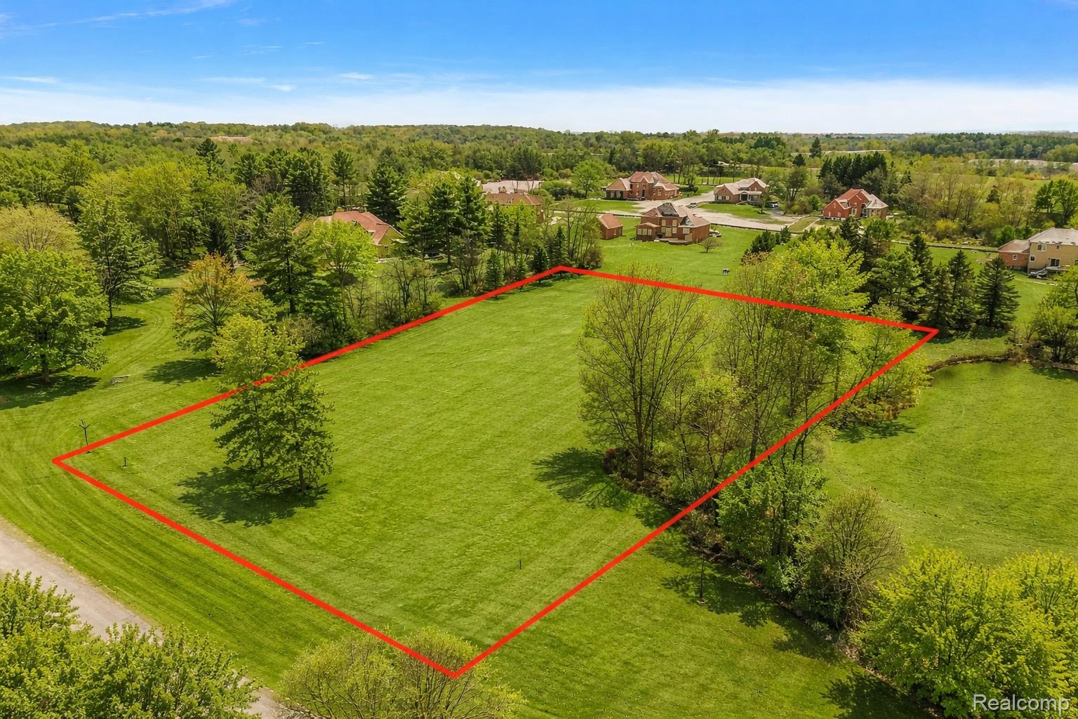 8267 Sandi Lane Romeo, MI 48065 - Photo 3 of 46 Expansive green lot with established trees