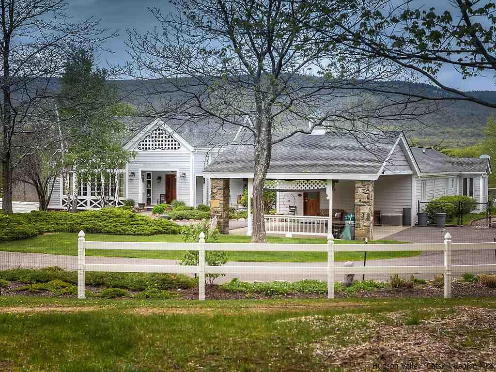 47 Saddleback Ridge Road Wallkill, NY 12589 - Photo 1 of 32 a front view of a house with a yard